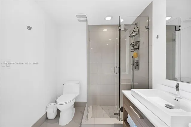 a bedroom with a bed and a television in it