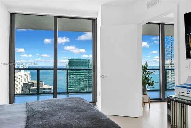 a en suite bathroom with a sink a toilet and a mirror