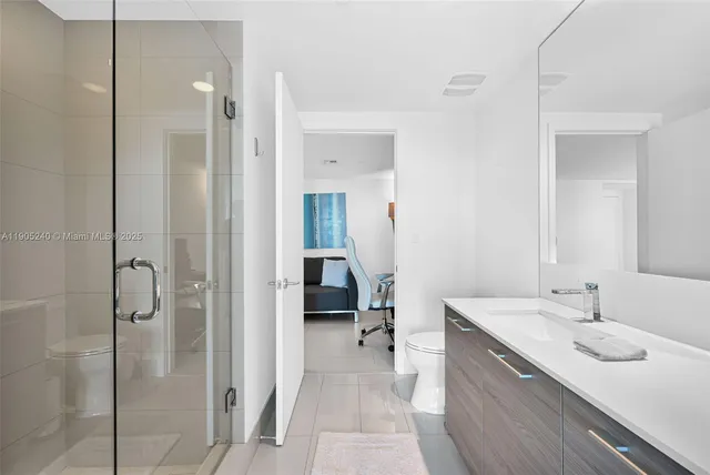 a view of city with tall buildings