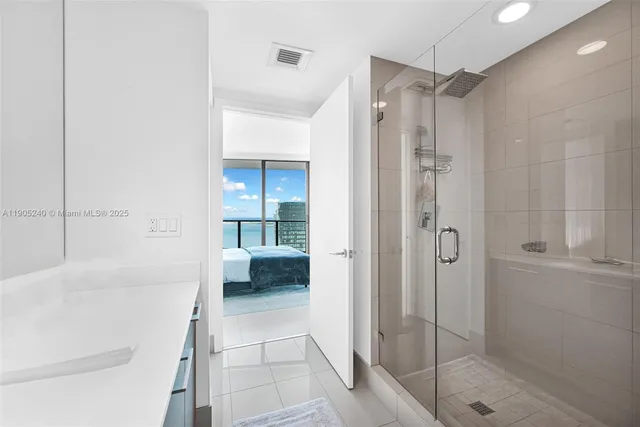 a living room with couches and painted walls