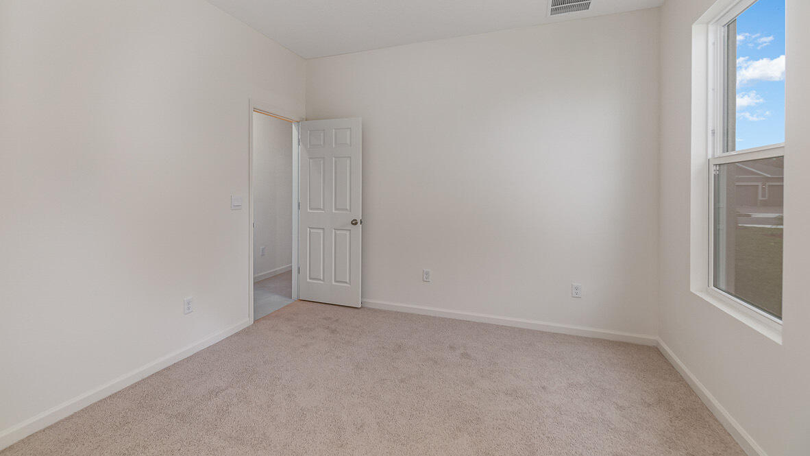 83 52nd Square Vero Beach, FL 32968 - Photo 11 of 21 a view of an empty room