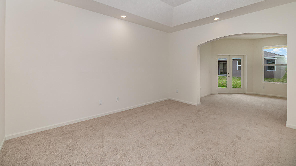 83 52nd Square Vero Beach, FL 32968 - Photo 13 of 21 an empty room with windows