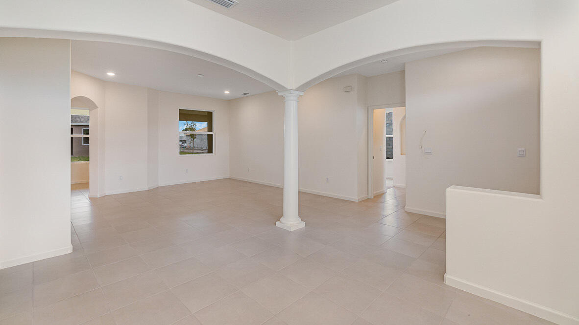 83 52nd Square Vero Beach, FL 32968 - Photo 3 of 21 a view of a livingroom with an empty space