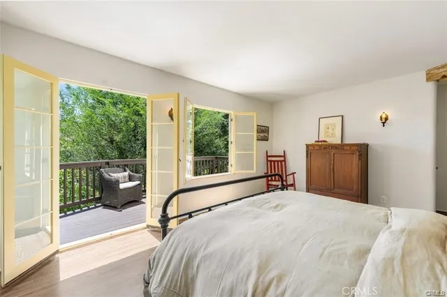 a white bath tub sitting next to a white sink