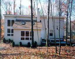556 Owl Pass Road Bushkill, PA 18324 - Photo 1 of 1 a view of a house with backyard