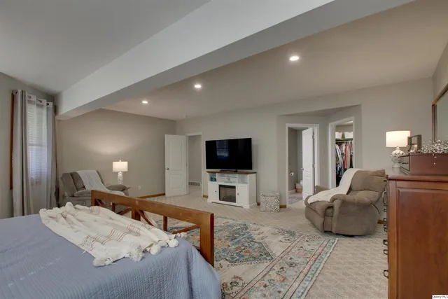 a living room with furniture and a couch