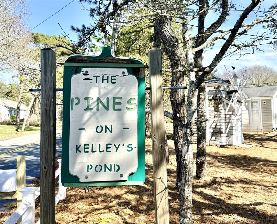 43 Pond Street, Unit 11 Dennis, MA 02670 - Photo 2 of 37 a sign on the side of a building