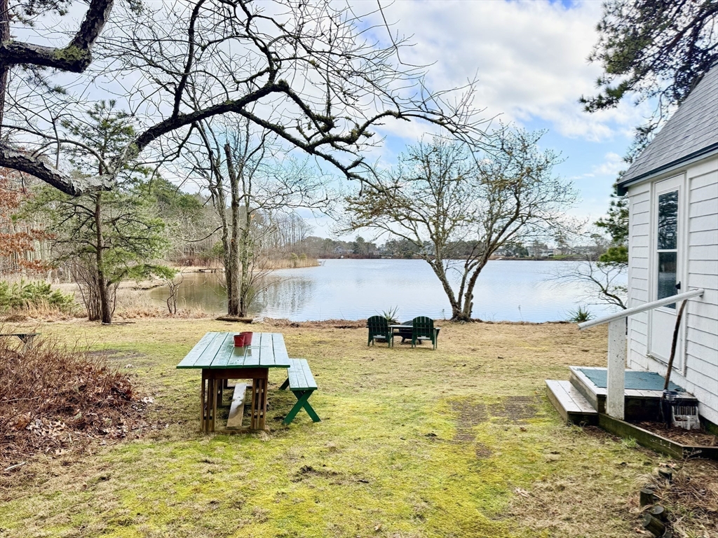 43 Pond Street, Unit 11 Dennis, MA 02670 - Photo 35 of 37 a view of a lake with houses