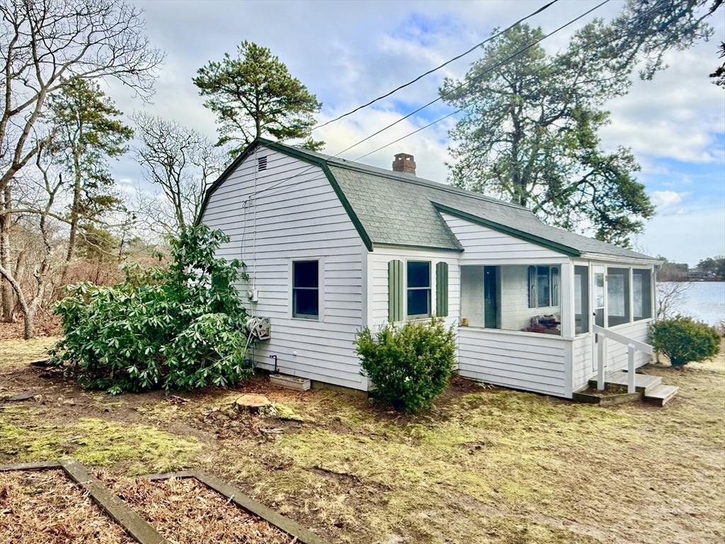 43 Pond Street, Unit 11 Dennis, MA 02670 - Photo 37 of 37 a view of a house with a yard