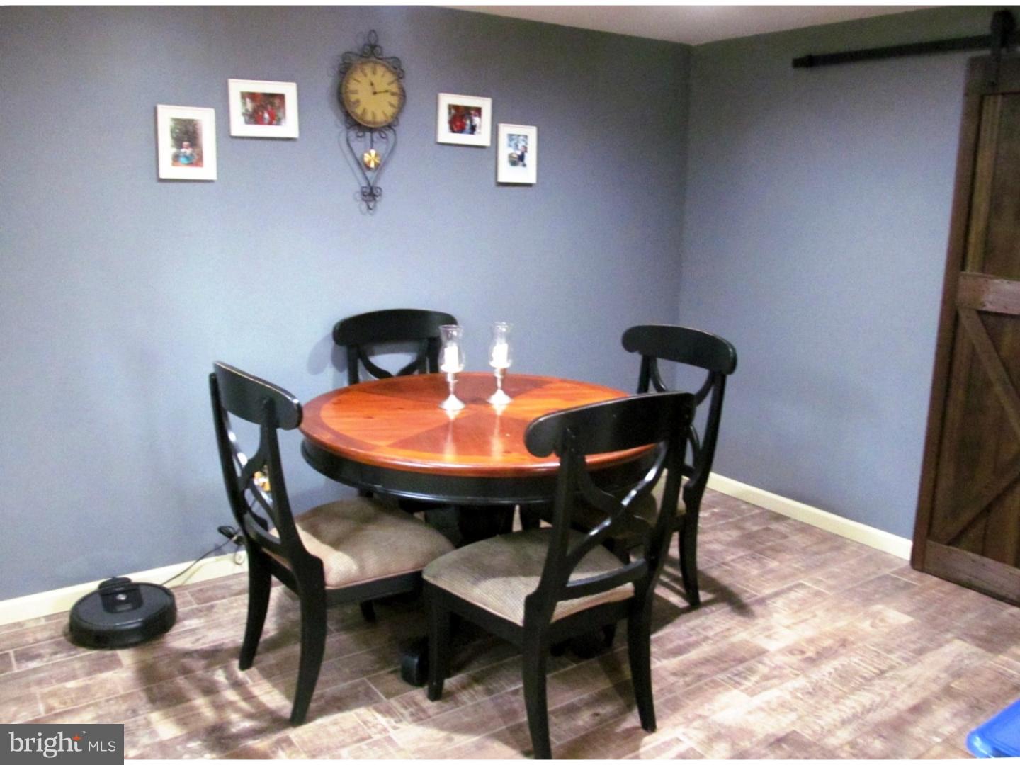 859 Kulp Road Perkiomenville, PA 18074 - Photo 12 of 24 ceramic tile floor extends into the dining room
