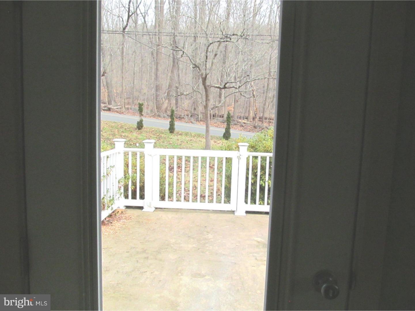 859 Kulp Road Perkiomenville, PA 18074 - Photo 16 of 24 Family room has walk-out to raised patio!