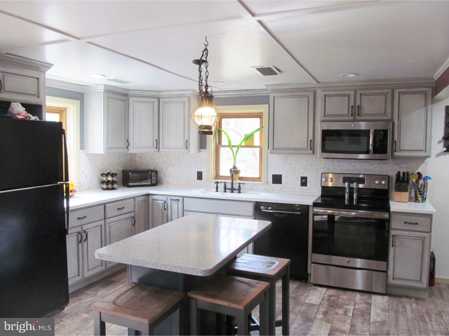859 Kulp Road Perkiomenville, PA 18074 - Photo 6 of 24 Neat, new kitchen w ceramic tile floor/radiant ht!