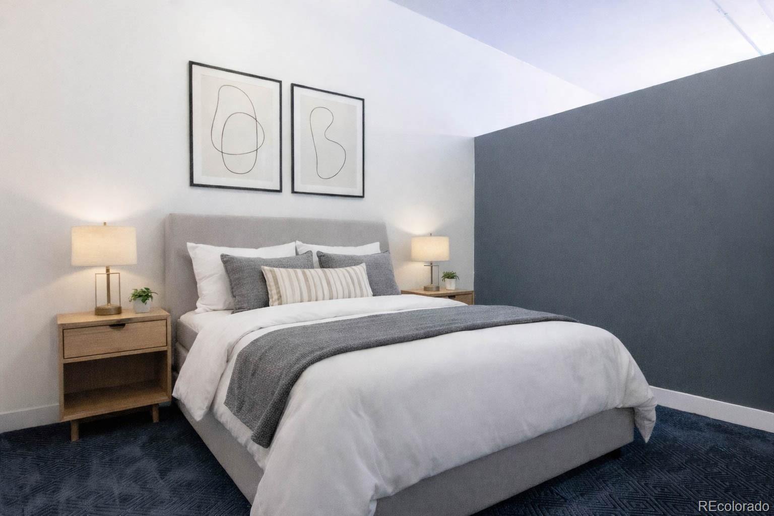 891 14th Street, Unit 2105 Denver, CO 80202 - Photo 20 of 50 a bedroom with bed and night stand