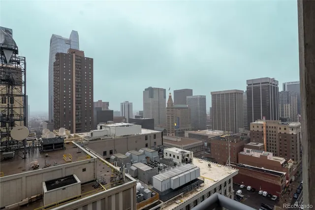 a view of parking garage with cars