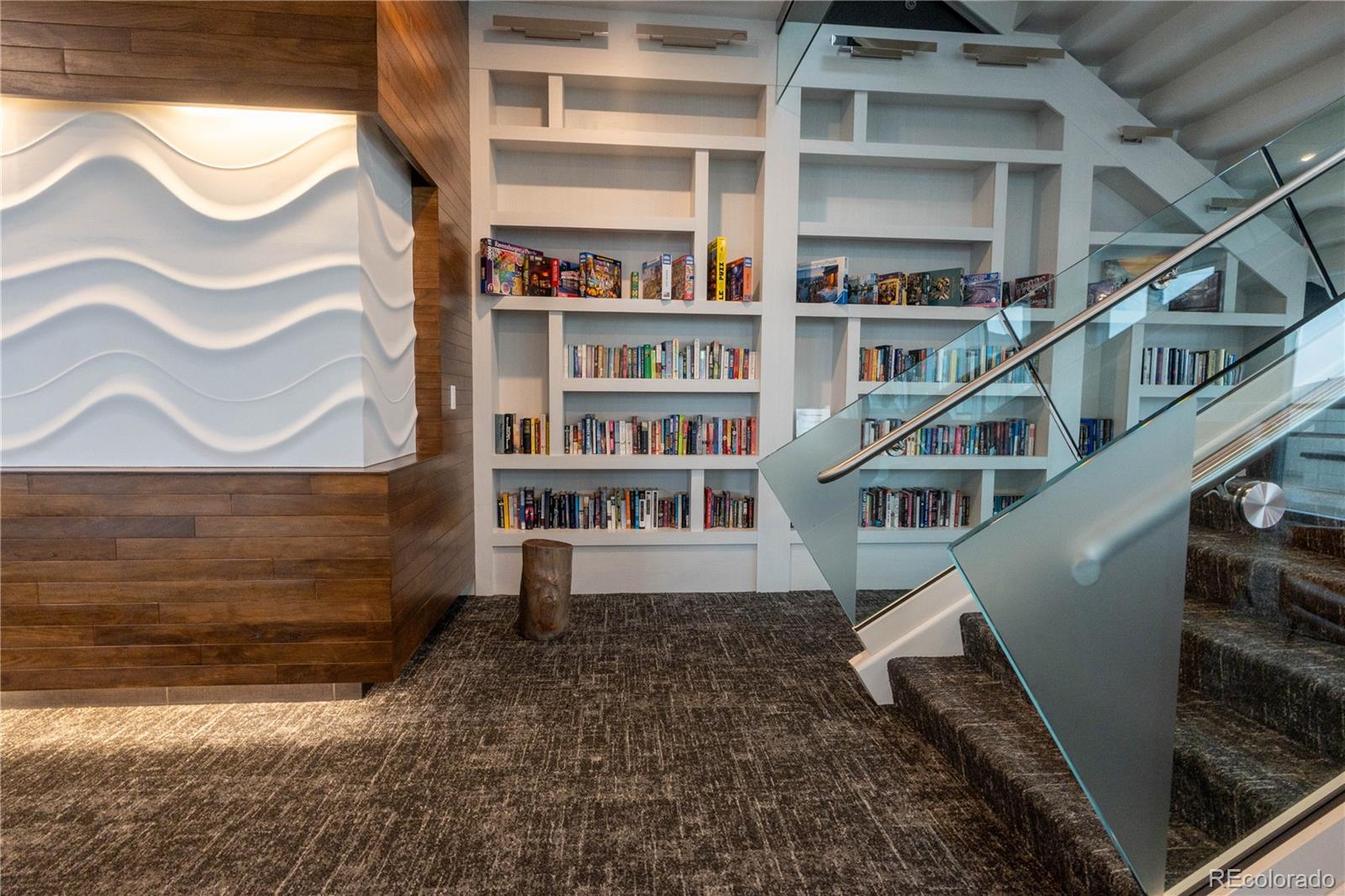 891 14th Street, Unit 2105 Denver, CO 80202 - Photo 42 of 50 a view of staircase with white walls and a window