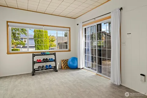 a room with furniture and a window