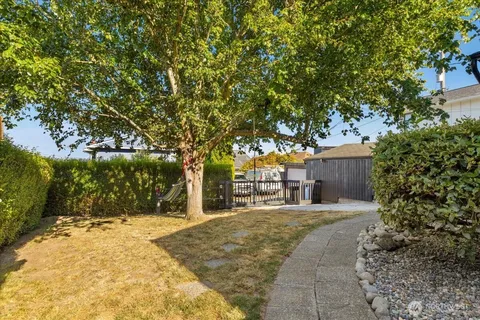 a house with trees in front of it