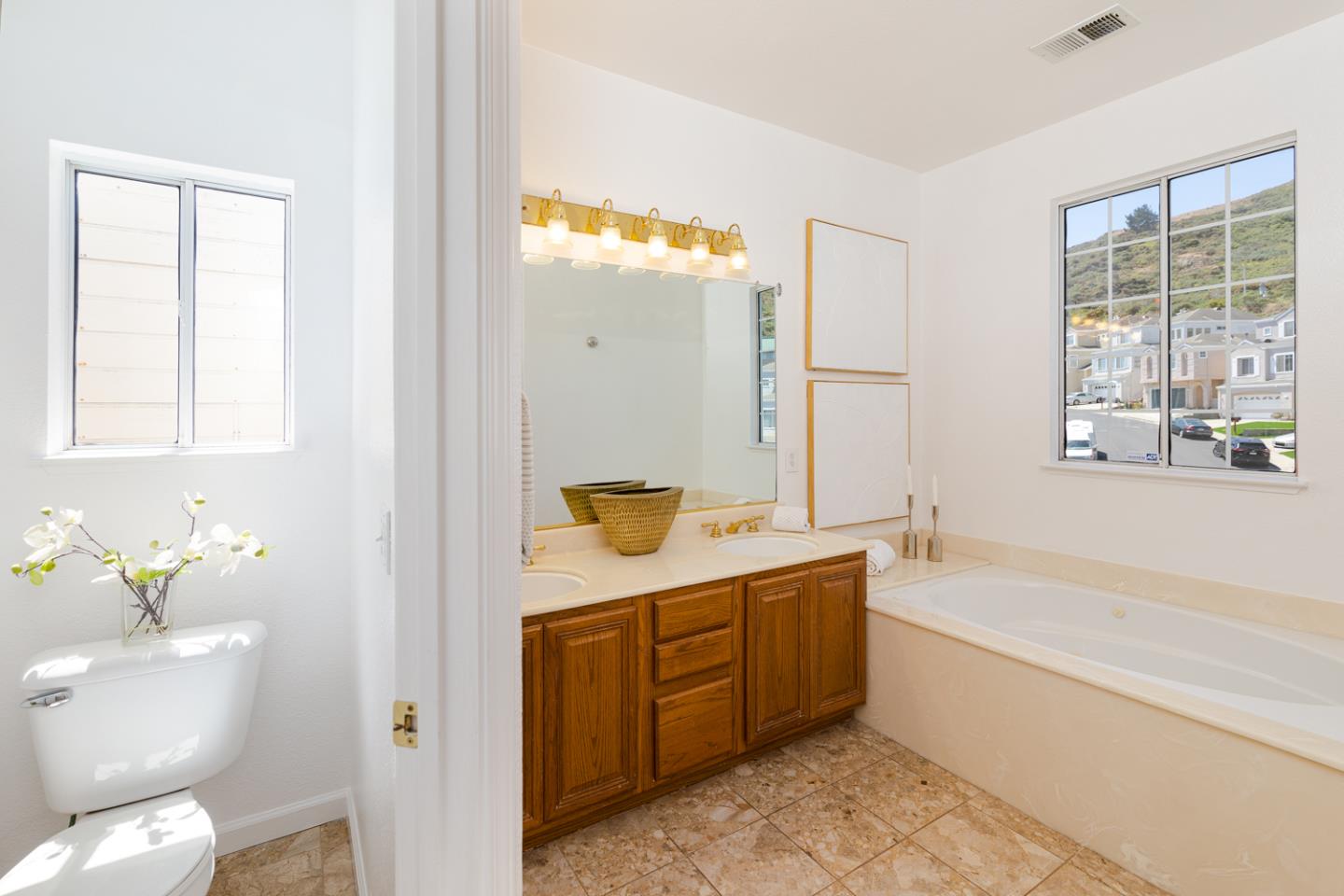 388 Bay Ridge Drive Daly City, CA 94014 - Photo 14 of 32 a bathroom with a granite countertop sink toilet and shower