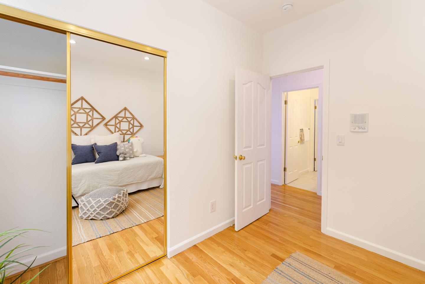 388 Bay Ridge Drive Daly City, CA 94014 - Photo 18 of 32 a bedroom with a bed and wooden floor