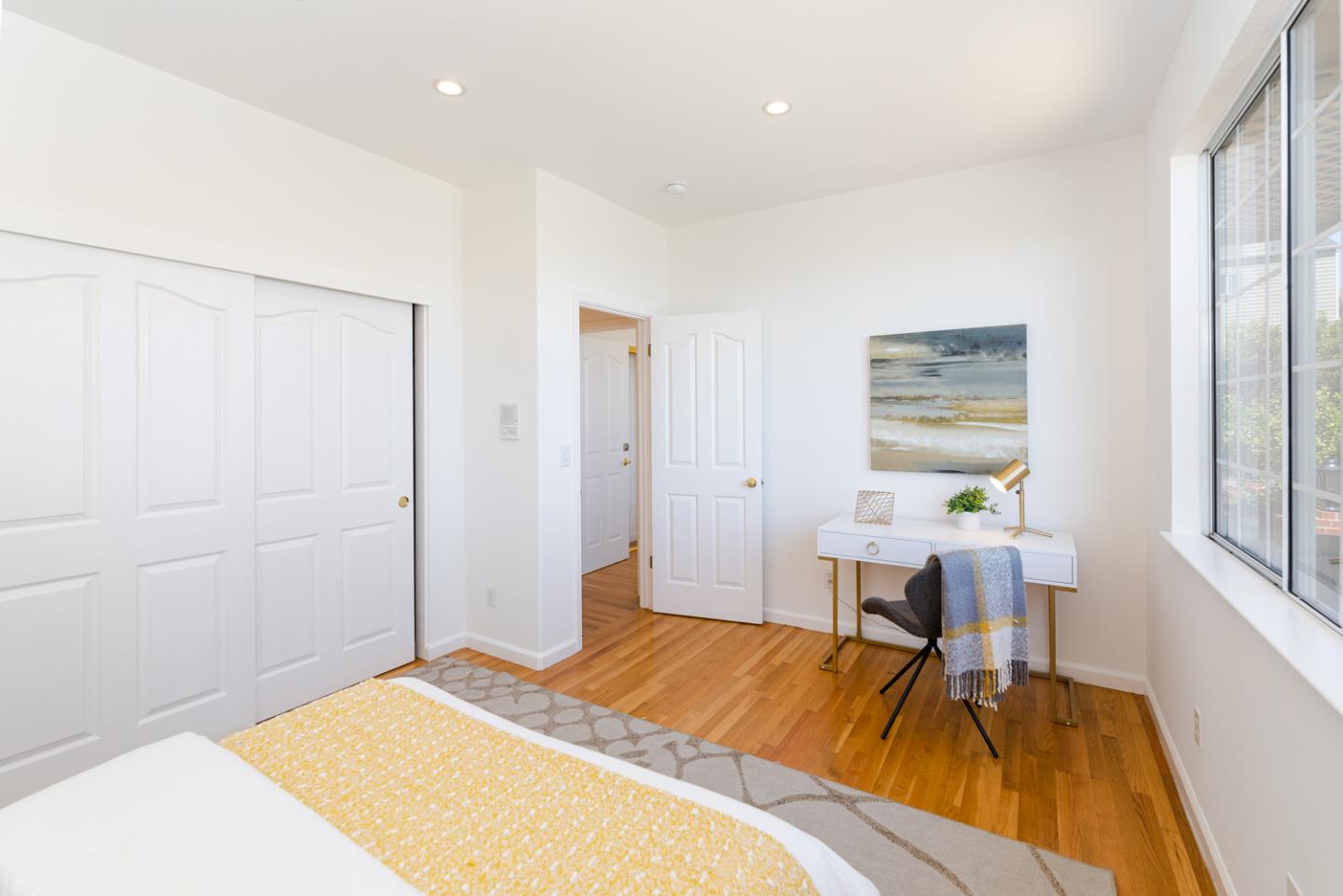 388 Bay Ridge Drive Daly City, CA 94014 - Photo 25 of 32 a bedroom with a bed and a table in it