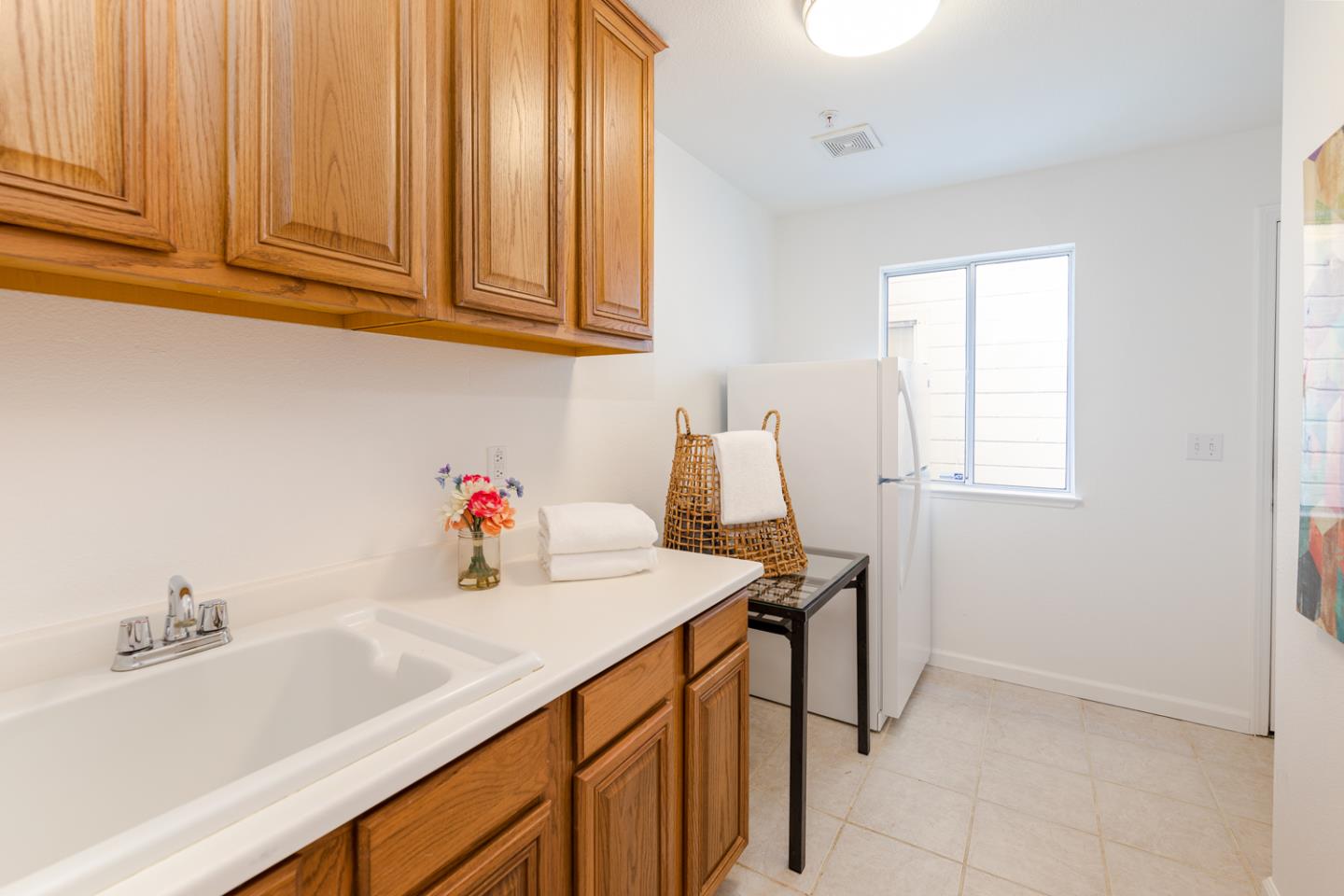 388 Bay Ridge Drive Daly City, CA 94014 - Photo 27 of 32 a kitchen with a sink cabinets and a window