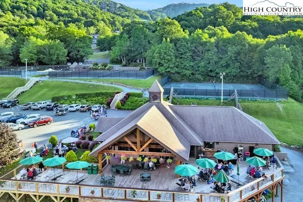 a view of a swimming pool with seating area