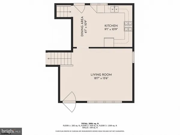 a picture of a bench in front of a wall