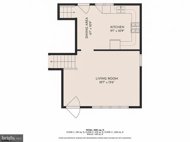 a picture of a bench in front of a wall