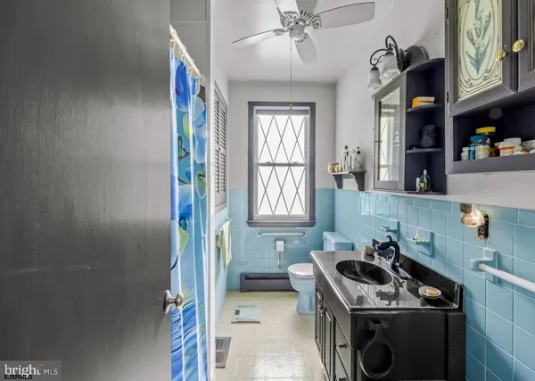 a kitchen that has a sink and a stove