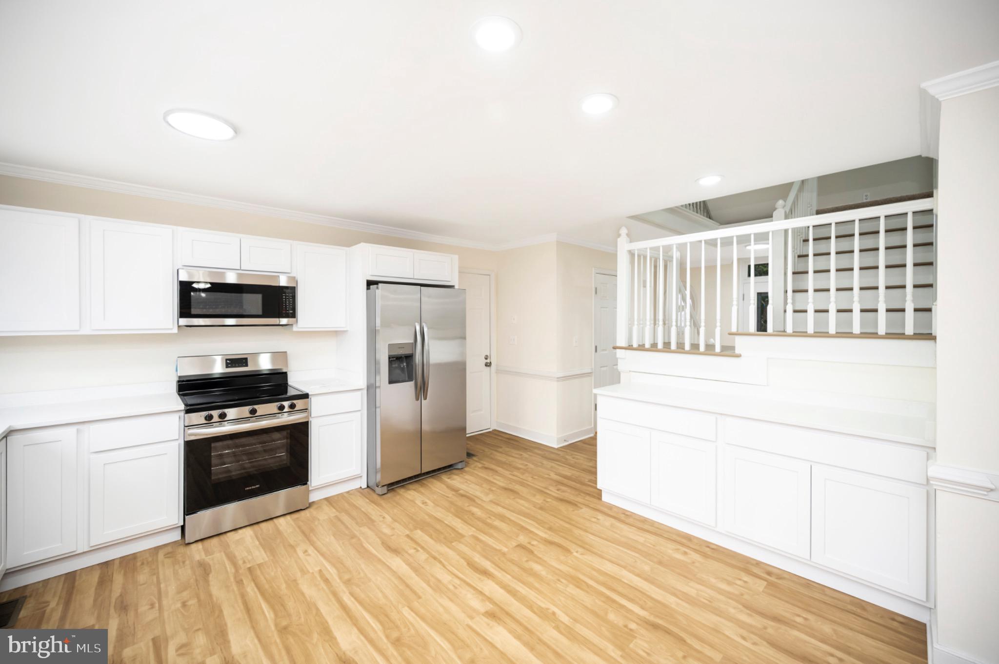 223 Spotswood Road Locust Grove, VA 22508 - Photo 13 of 64 Modern kitchen with sleek finishes.