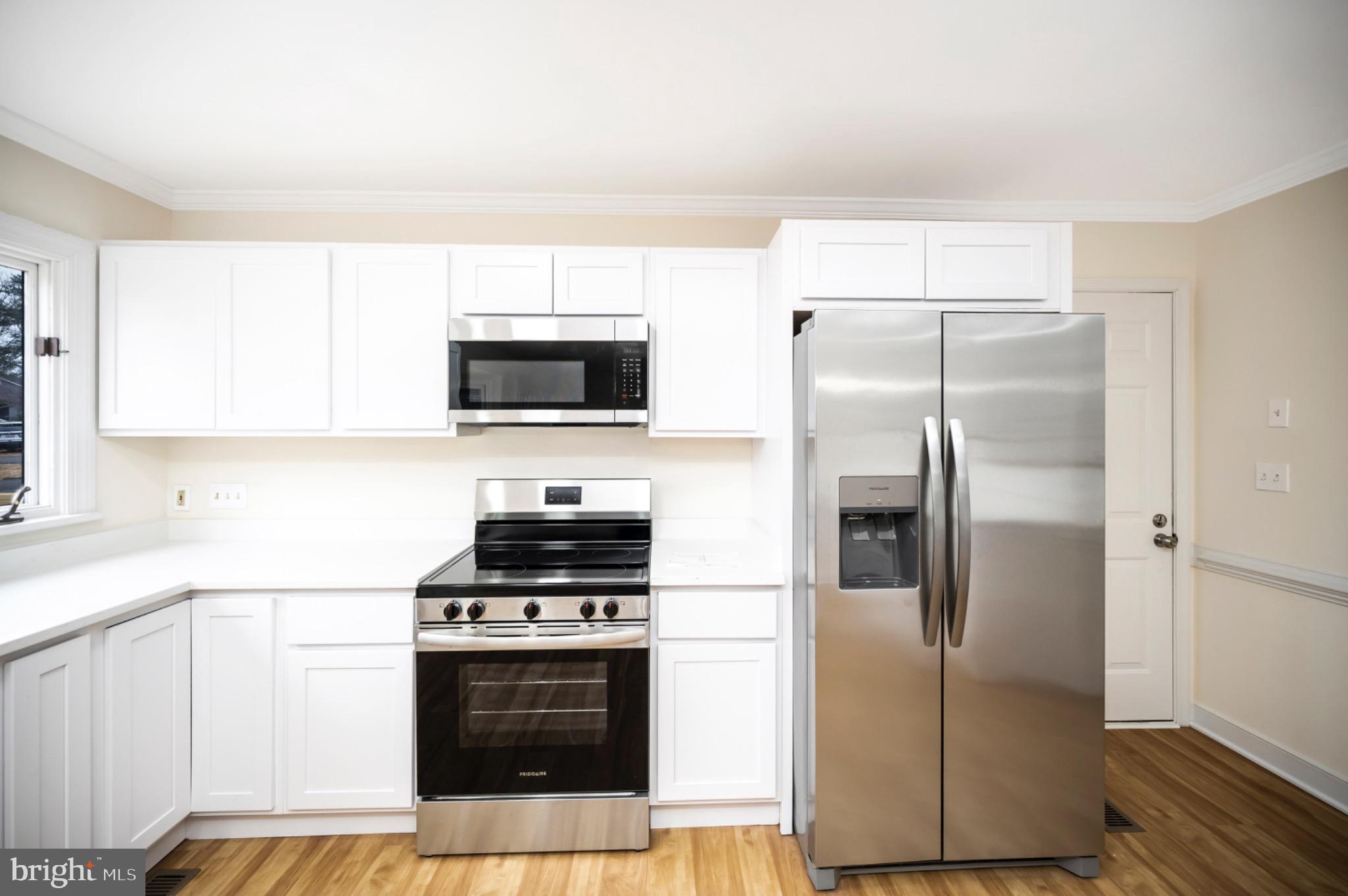 223 Spotswood Road Locust Grove, VA 22508 - Photo 14 of 64 Modern kitchen with sleek appliances.