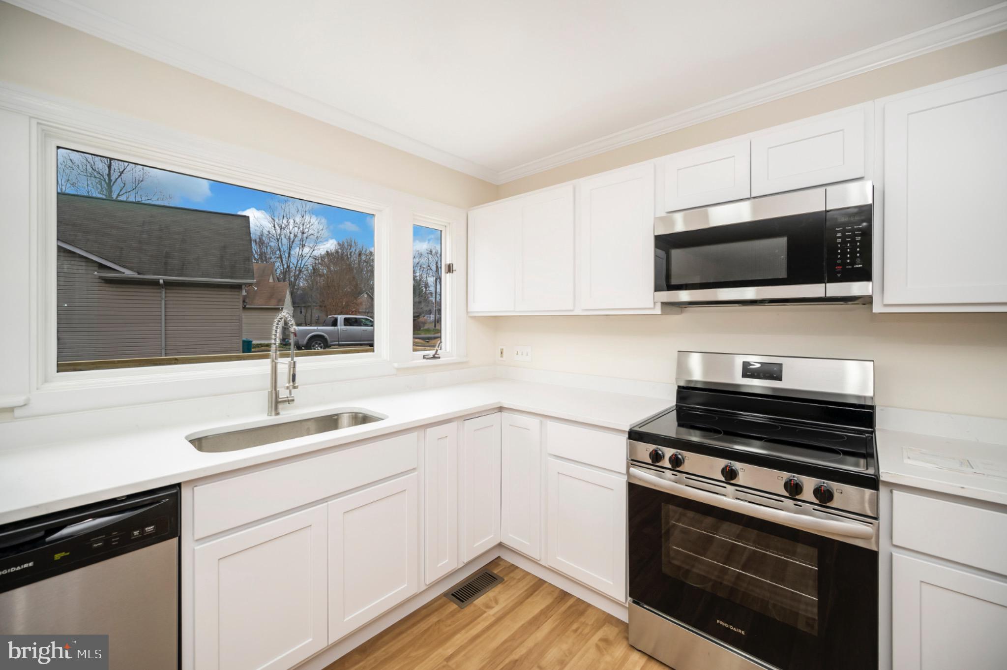 223 Spotswood Road Locust Grove, VA 22508 - Photo 15 of 64 Bright and modern kitchen with scenic views.