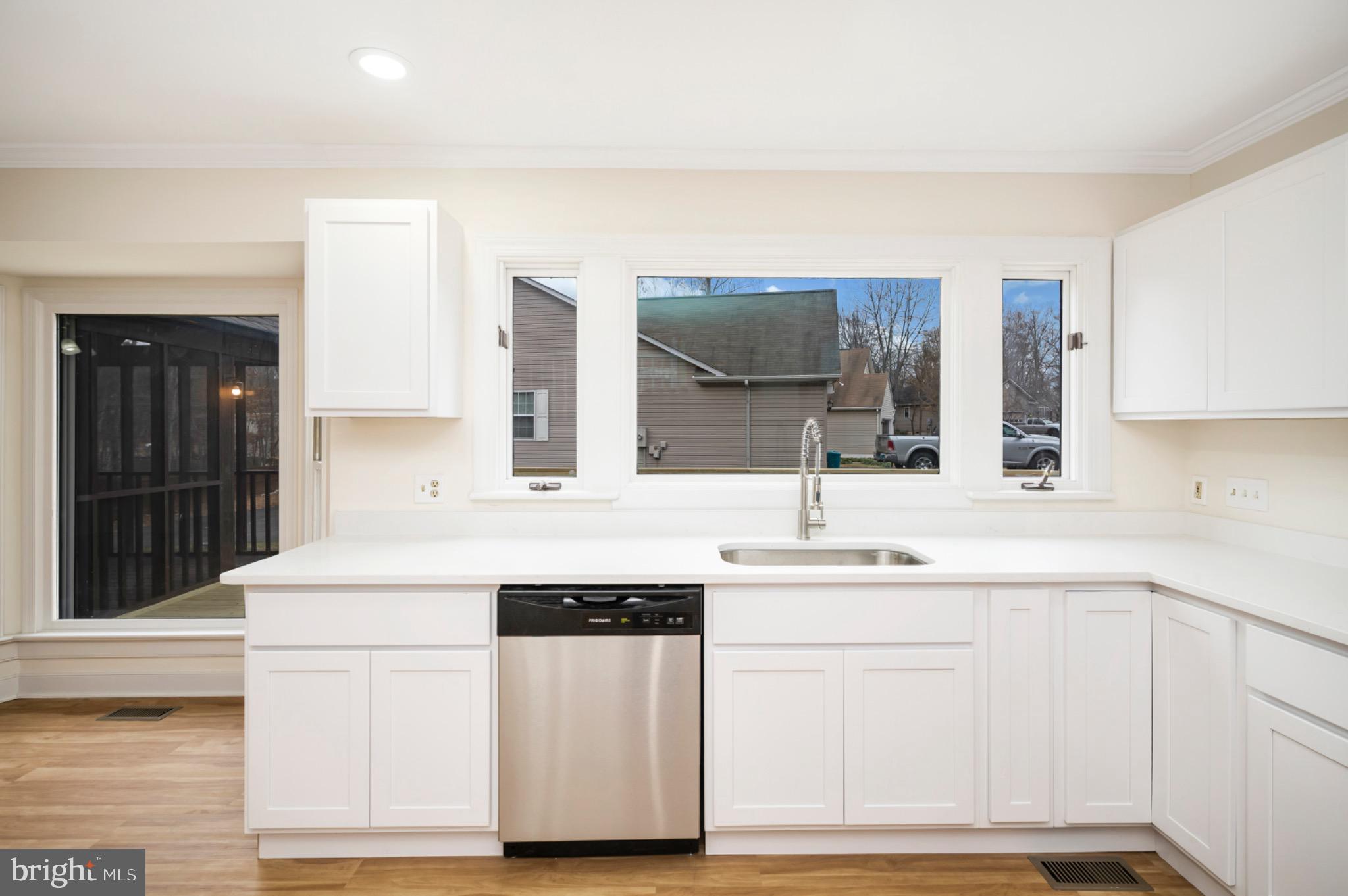 223 Spotswood Road Locust Grove, VA 22508 - Photo 16 of 64 Bright and airy kitchen with modern finishes.