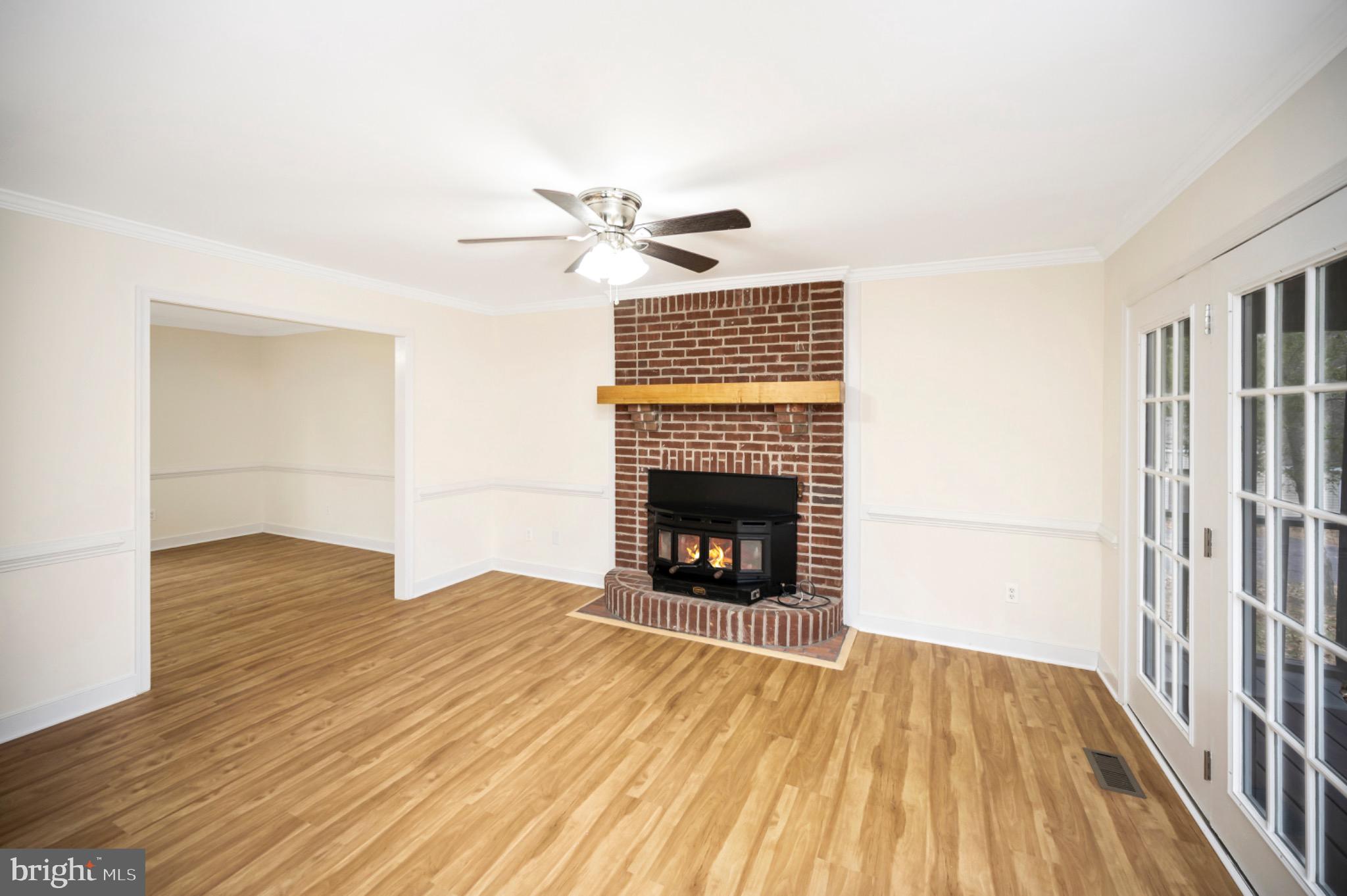 223 Spotswood Road Locust Grove, VA 22508 - Photo 20 of 64 Cozy living space with charming fireplace.