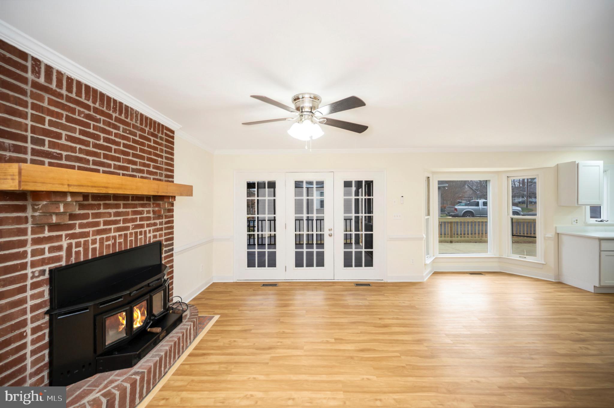 223 Spotswood Road Locust Grove, VA 22508 - Photo 22 of 64 Inviting space with cozy fireplace charm.