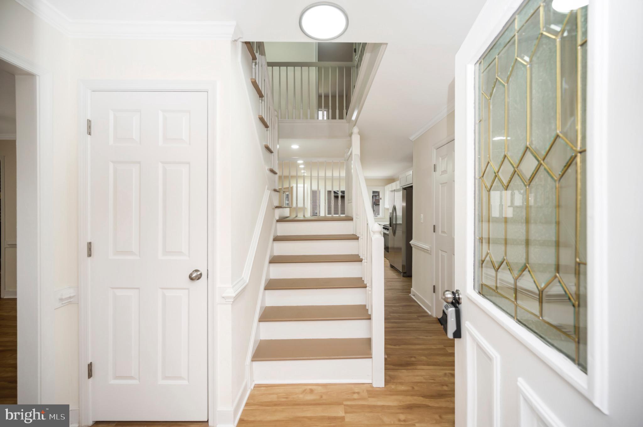 223 Spotswood Road Locust Grove, VA 22508 - Photo 4 of 64 Bright and inviting entryway with stairs.