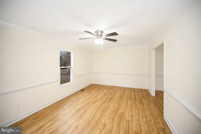 a view of a kitchen with a sink and dishwasher cabinets