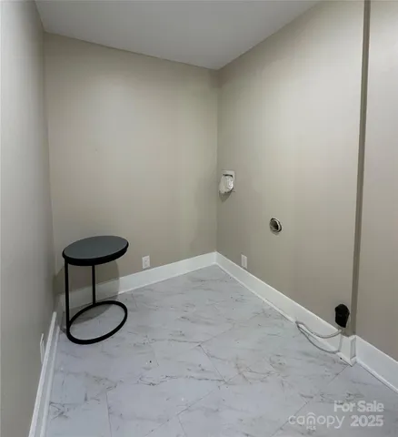 a view of a room with racks on the wall