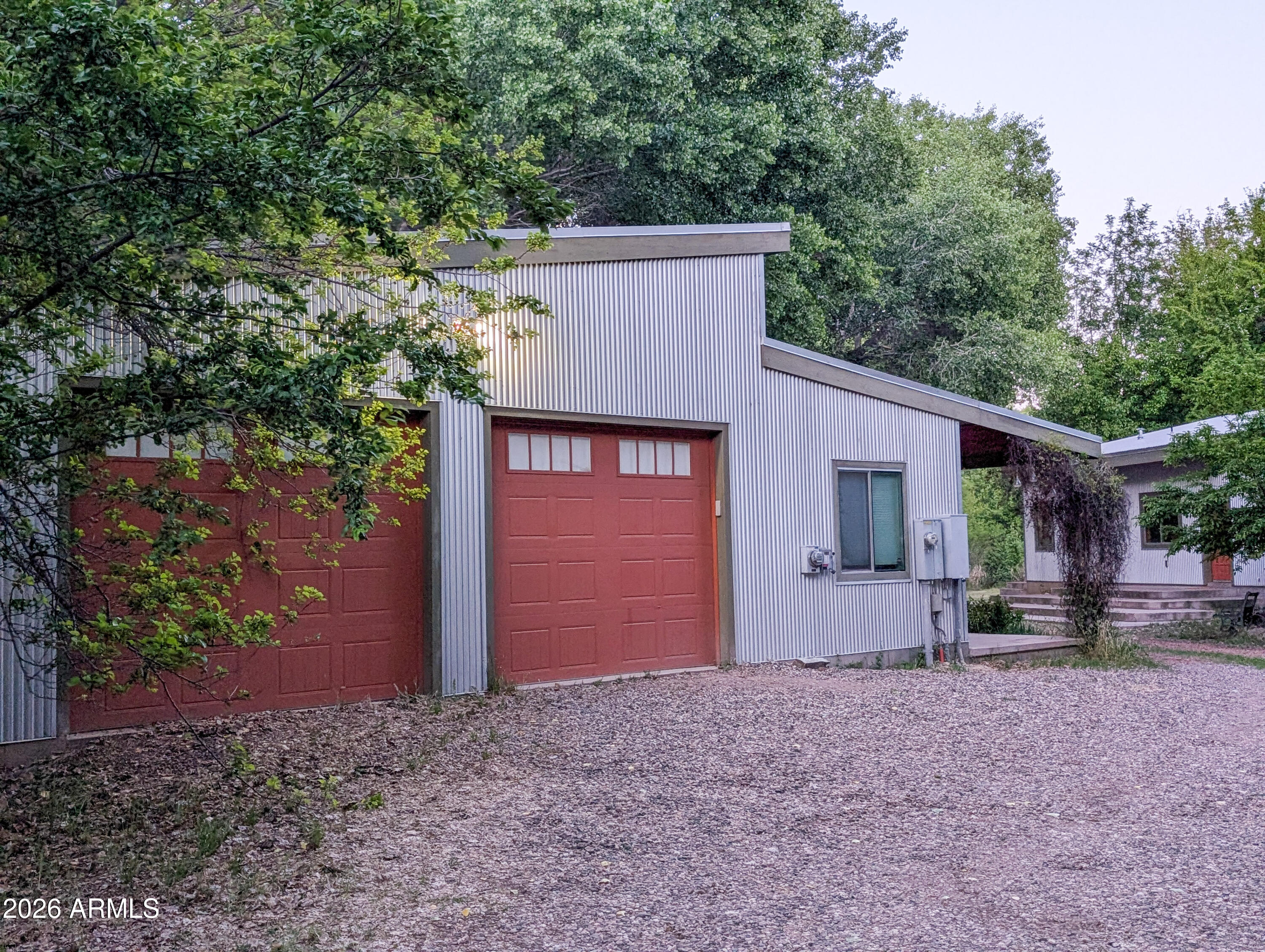 1165 North Willard Road Cottonwood, AZ 86326 - Photo 14 of 122 a view of a house with a yard and garage