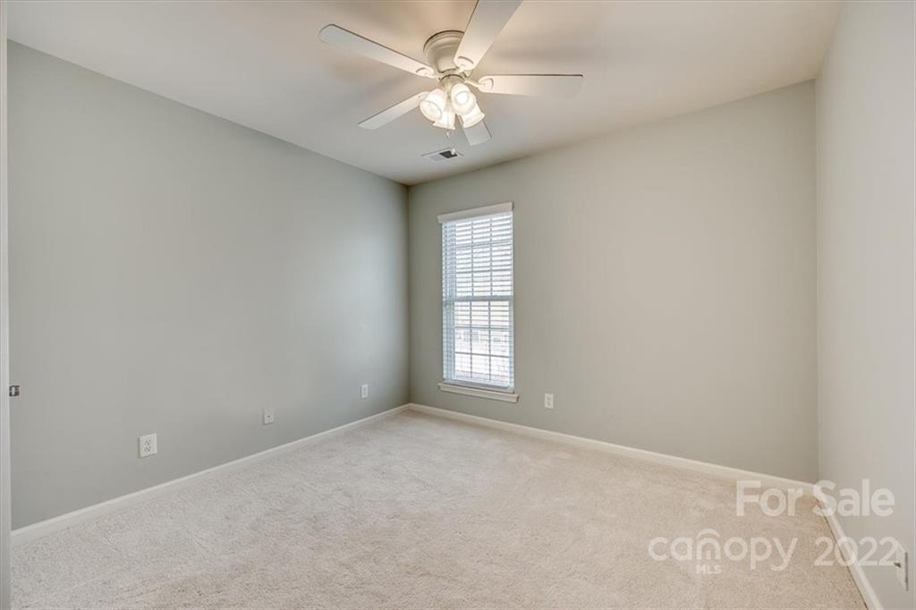 927 Lyndley Drive Fort Mill, SC 29708 - Photo 23 of 48 a view of an empty room with a window