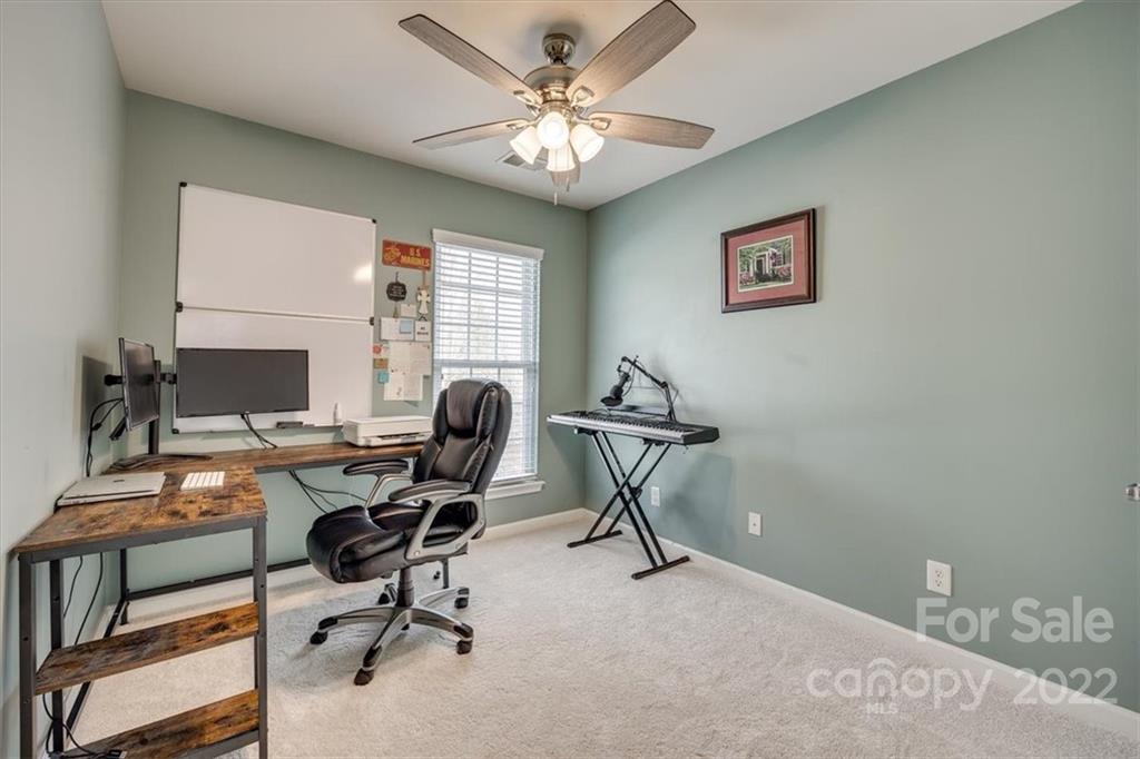 927 Lyndley Drive Fort Mill, SC 29708 - Photo 24 of 48 a view of a workspace with furniture and a window