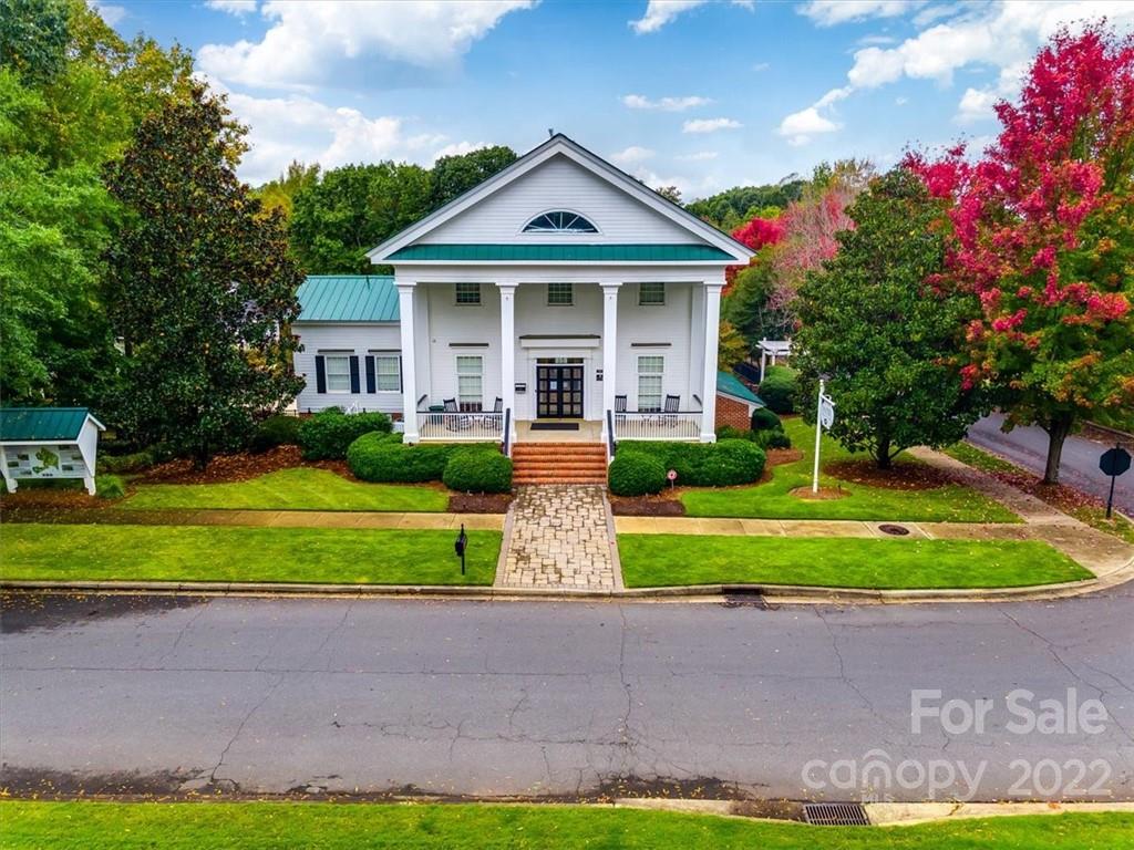927 Lyndley Drive Fort Mill, SC 29708 - Photo 34 of 48 a front view of a house with a yard and trees