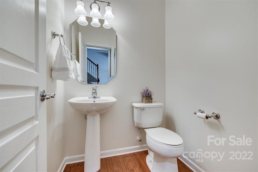 927 Lyndley Drive Fort Mill, SC 29708 - Photo 8 of 48 a bathroom with a toilet sink and mirror