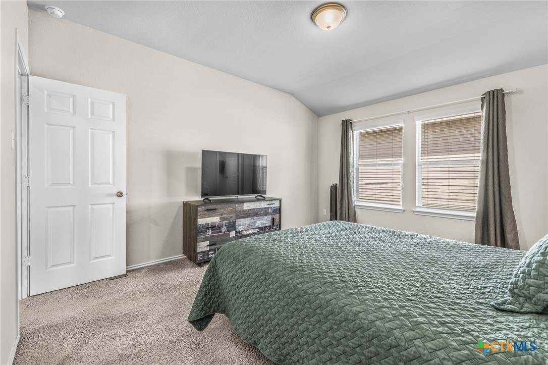 1006 Rosa Parks Drive Killeen, TX 76543 - Photo 13 of 34 a bedroom with a bed and flat screen tv