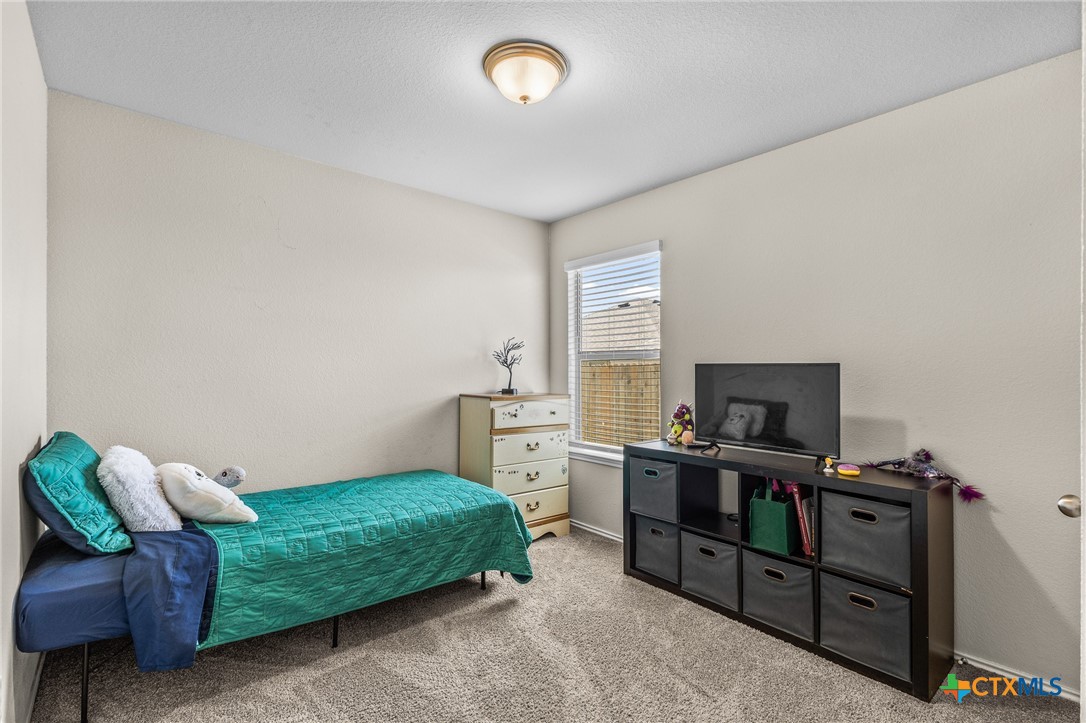 1006 Rosa Parks Drive Killeen, TX 76543 - Photo 24 of 34 a bedroom with a bed and a window