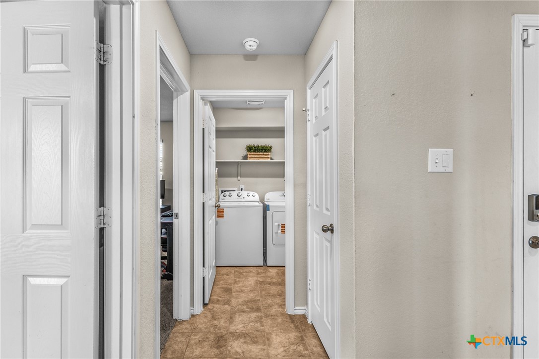 1006 Rosa Parks Drive Killeen, TX 76543 - Photo 26 of 34 a view of a hallway with two rooms