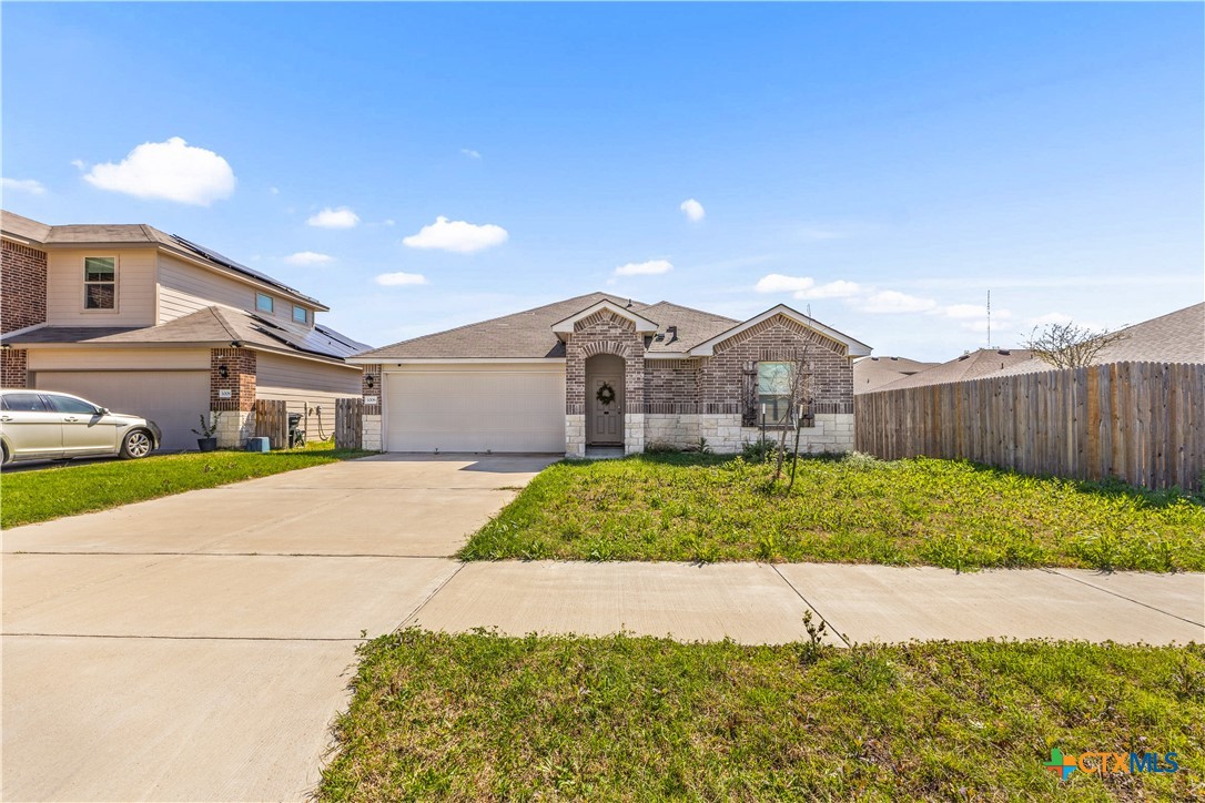 1006 Rosa Parks Drive Killeen, TX 76543 - Photo 34 of 34 a view of a large house with a street