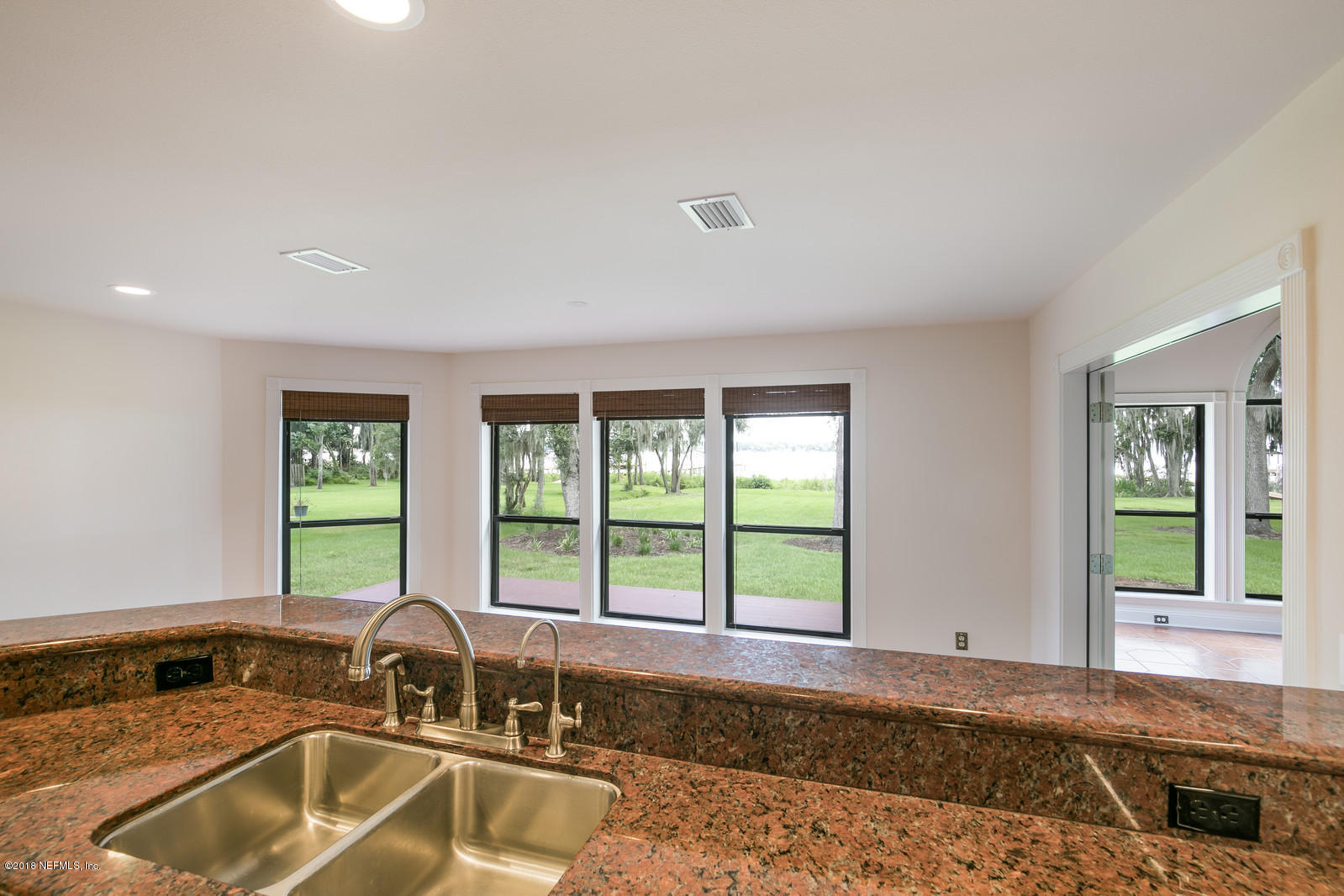 3130 Nautilus Road Middleburg, FL 32068 - Photo 18 of 67 a kitchen with a sink and a window