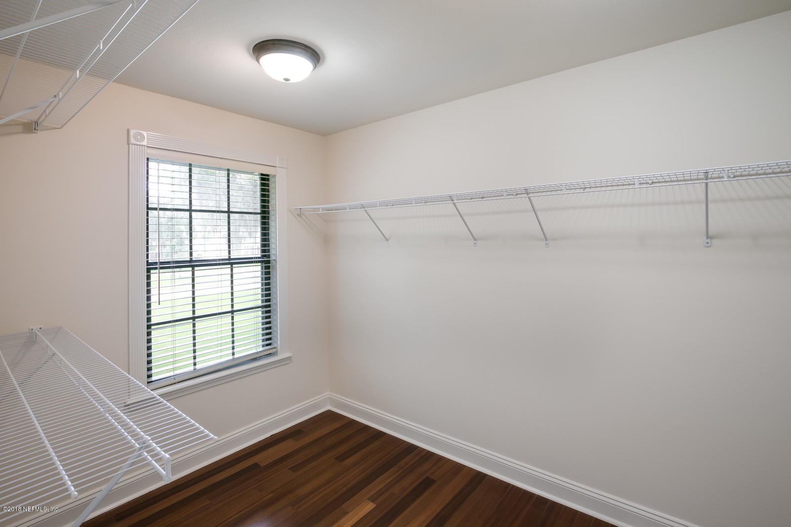3130 Nautilus Road Middleburg, FL 32068 - Photo 27 of 67 a view of a room with racks on the wall