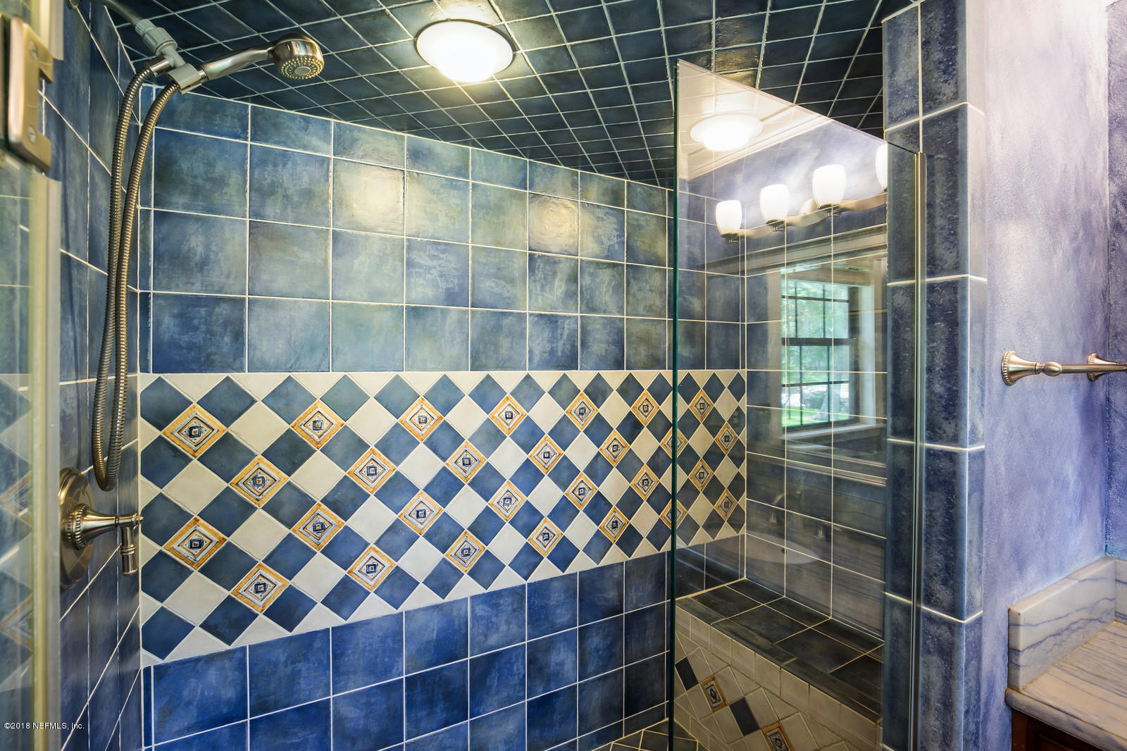 3130 Nautilus Road Middleburg, FL 32068 - Photo 30 of 67 a bathroom with a shower